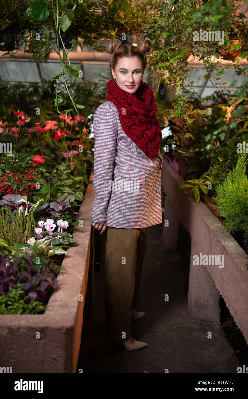 Woman wearing green coat hires stock photography and images Alamy