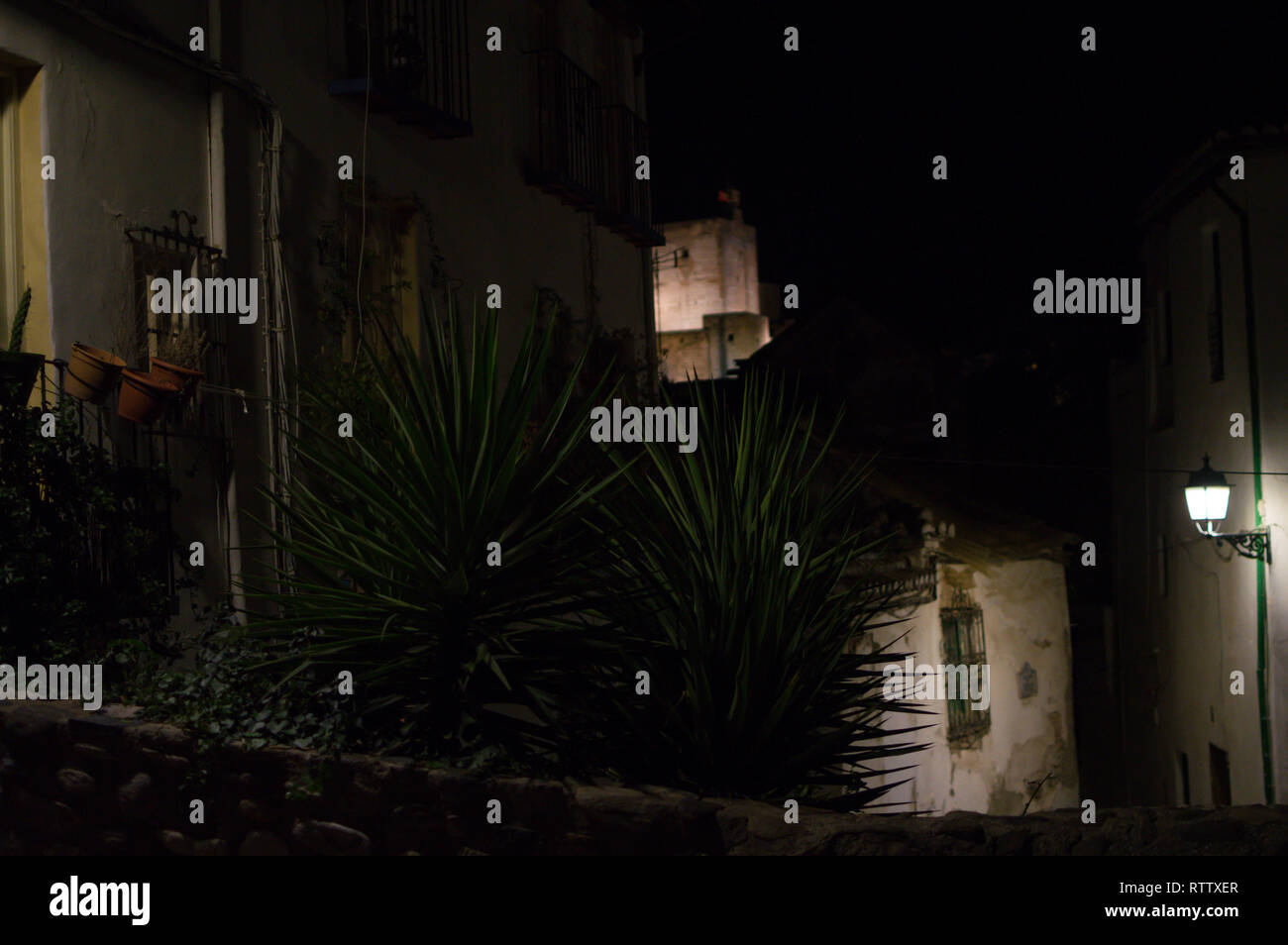 Alleyway In The Moorish Quarter Albayzin With Alhambra In The Background At Night Granada Spain Stock Photo Alamy