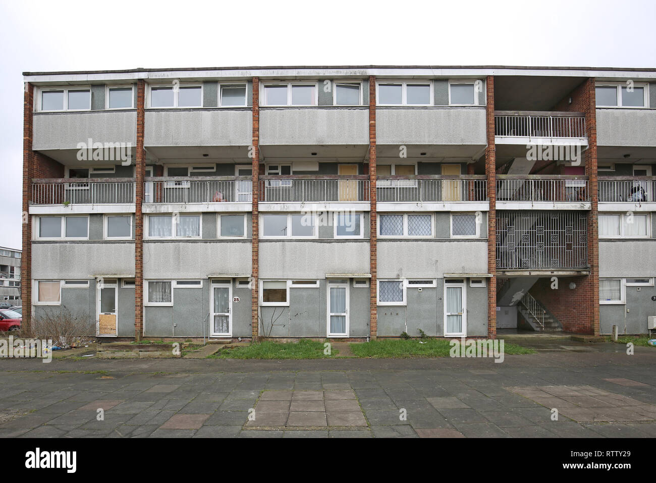 A run-down, four storey block of council maisononets in Basildon, Essex, UK. Flats still occupied but scheduled for demolition. Stock Photo