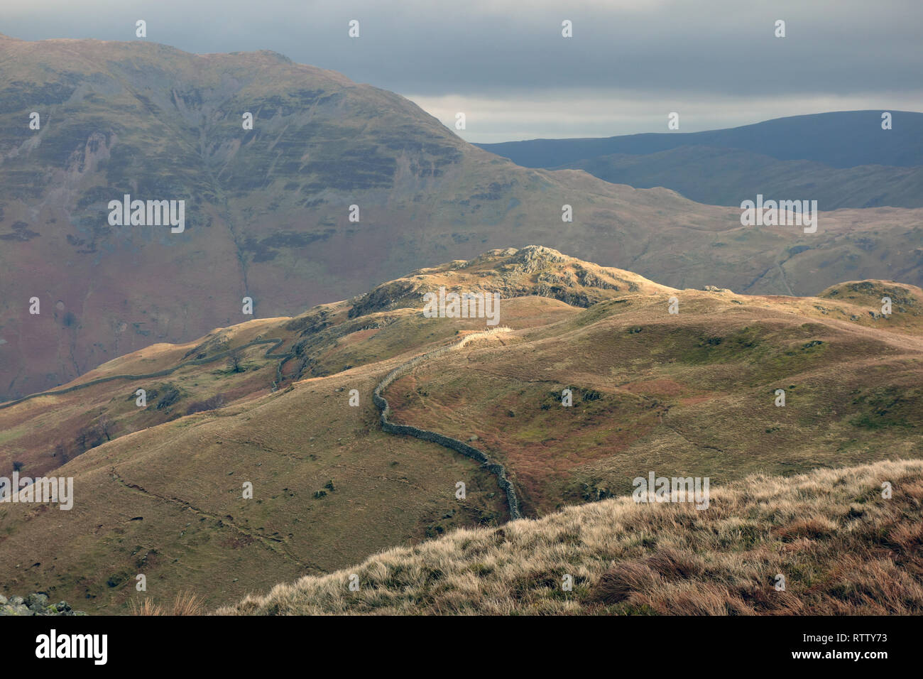 The Wainwrights Arnison Crag and Place Fell from Ascent of Birks in Patterdale, Lake District National Park, Cumbria, England, UK. Stock Photo