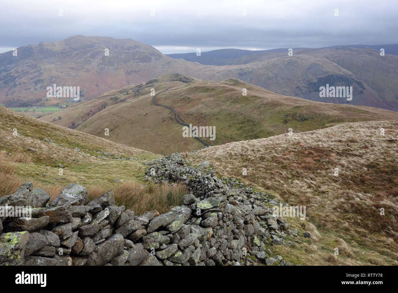 The Wainwrights Arnison Crag and Place Fell from Ascent of Birks in Patterdale, Lake District National Park, Cumbria, England, UK. Stock Photo