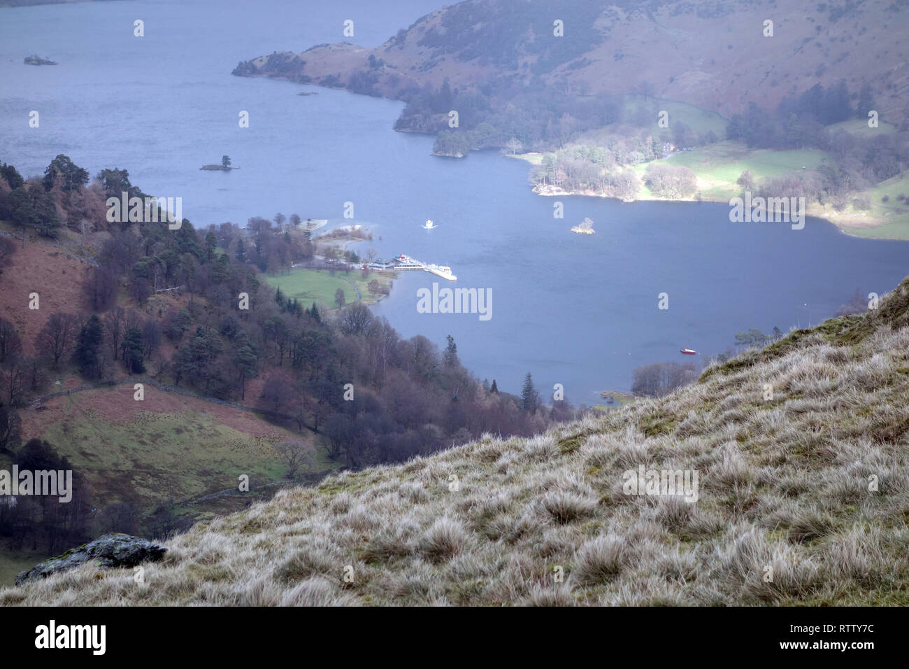 Ullswater Ferry Pier & Patterdale from the Path to the Wainwright Birks in Lake District National Park, Cumbria, England, UK. Stock Photo
