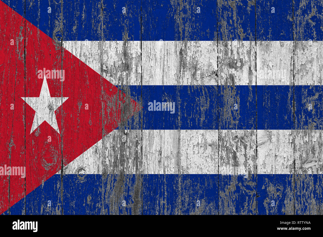 Flag of Cuba painted on worn out wooden texture background Stock Photo ...