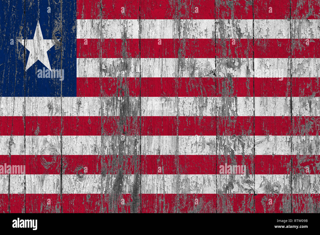 Flag of Liberia painted on worn out wooden texture background Stock ...