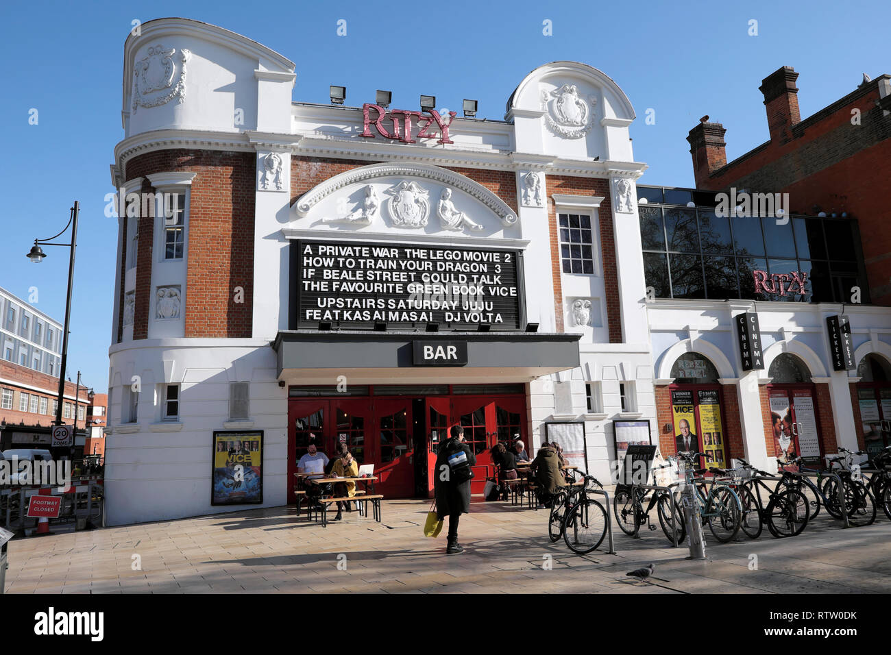 Ritzy Cinema and Bar exterior view showing movies films in Brixton South London England UK Great Britain Europe  KATHY DEWITT Stock Photo