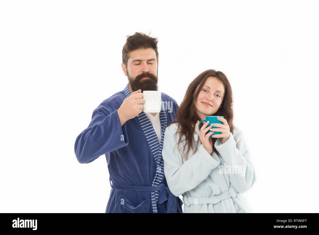 First sip in morning. Couple relax in morning with coffee. Family