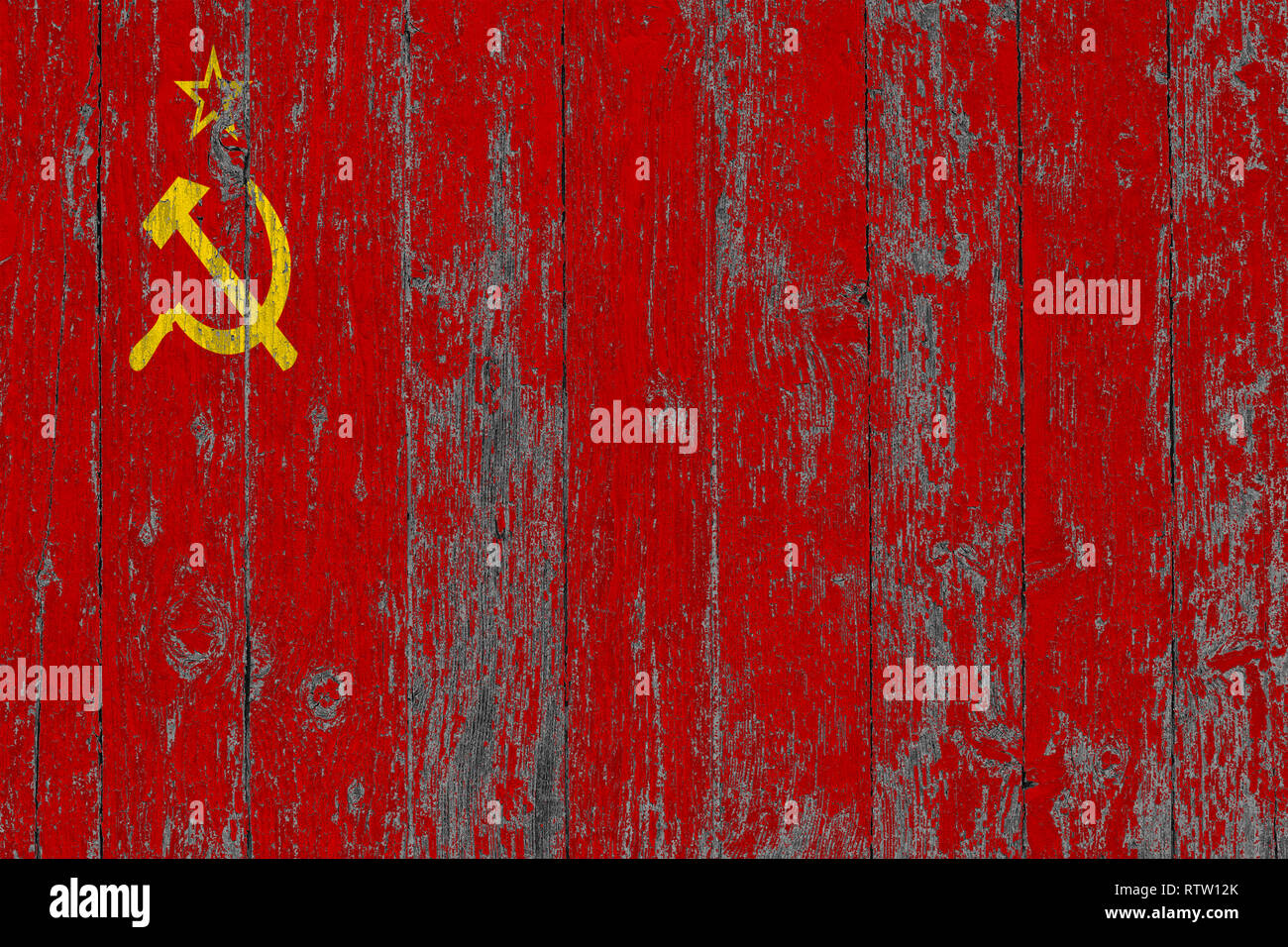 Flag of Soviet Union painted on worn out wooden texture background. Stock Photo