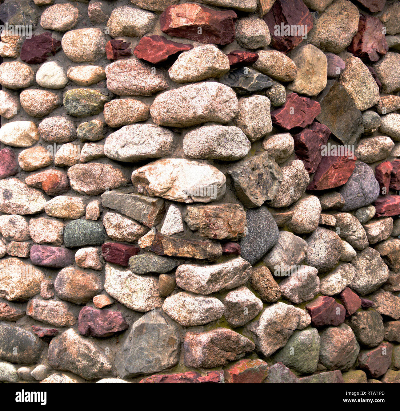 Stone wall rounded stones hi-res stock photography and images - Alamy