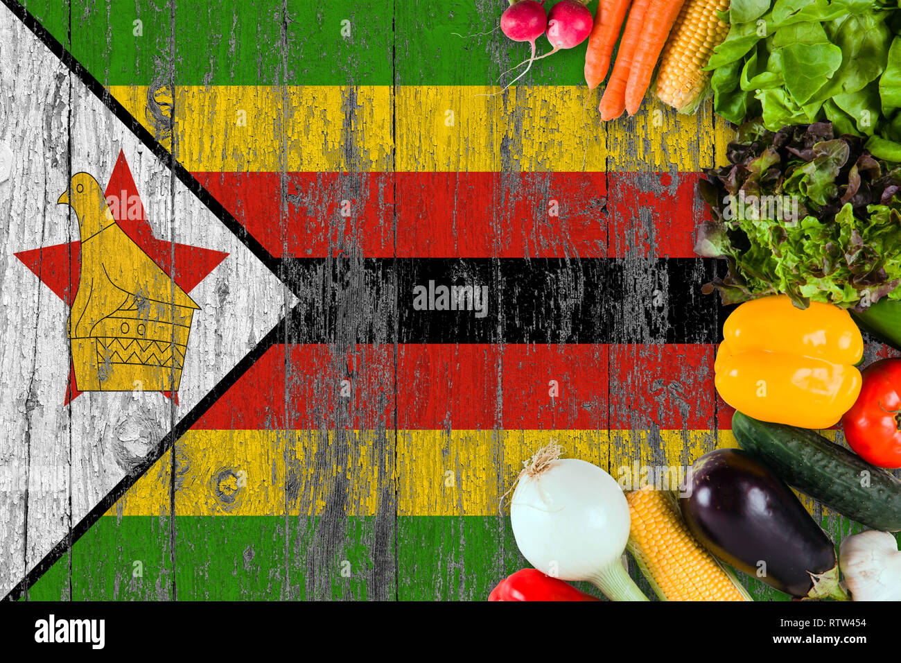 Fresh vegetables from Zimbabwe on table. Cooking concept on wooden flag