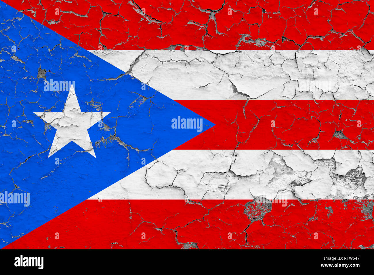 Flag of Puerto Rico painted on cracked dirty wall. National pattern on ...