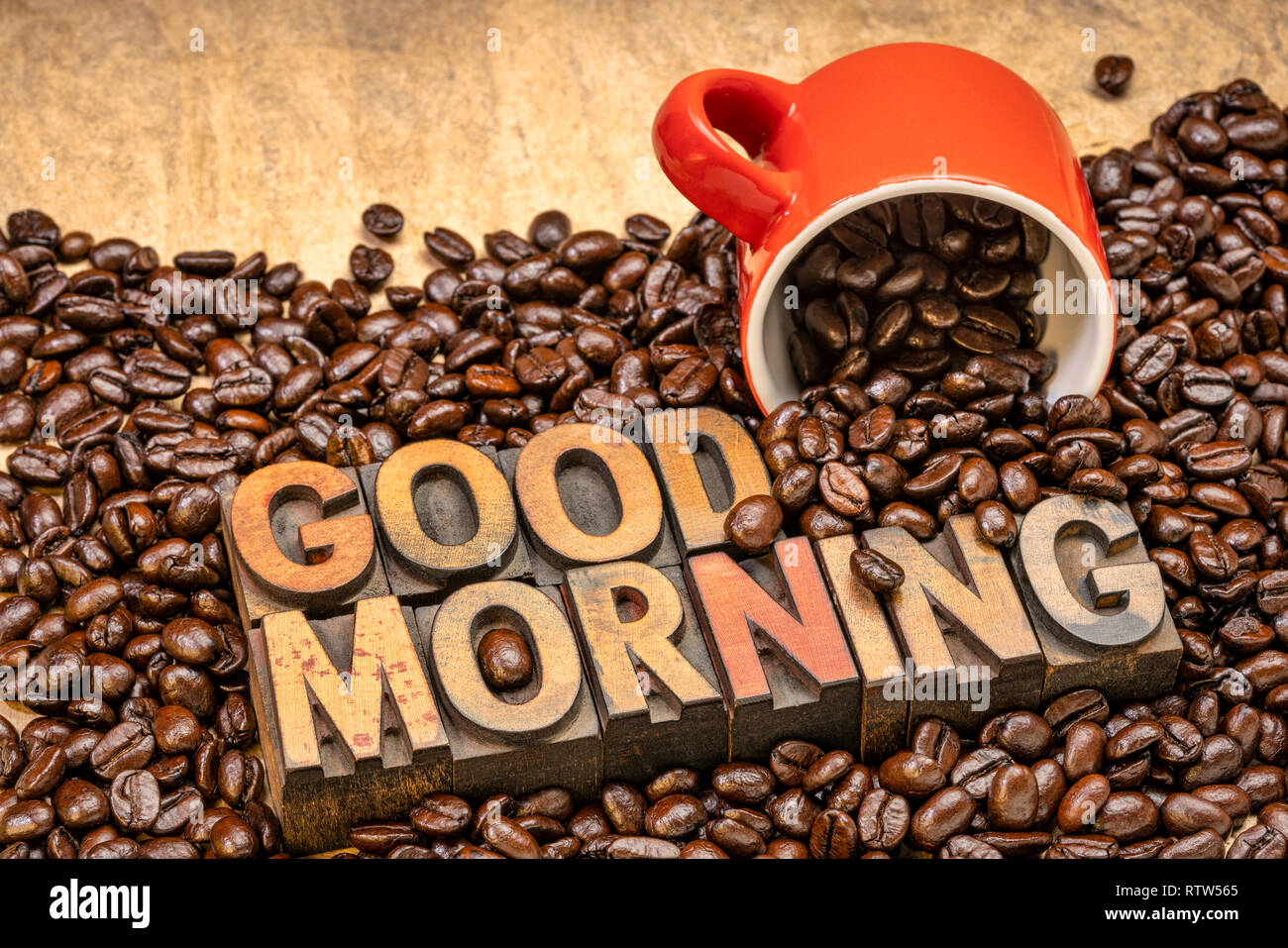 Good Morning - text in vintage letterpress wood type with coffee beans and a cup Stock Photo