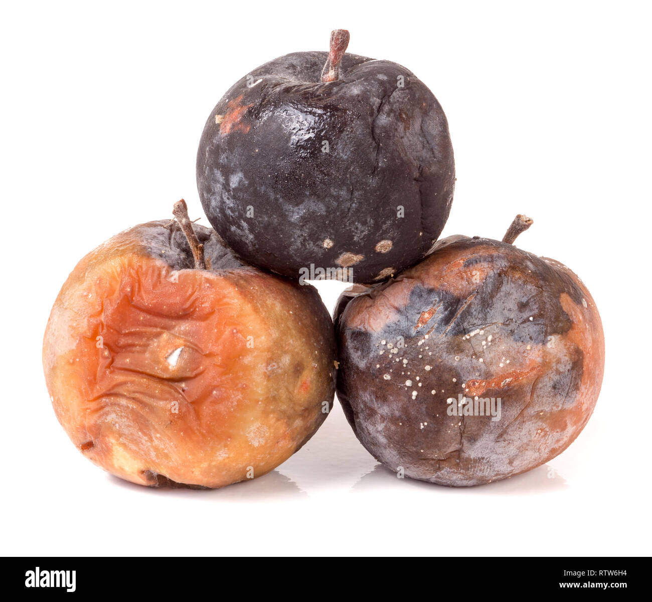 three rotten apple isolated on a white background Stock Photo