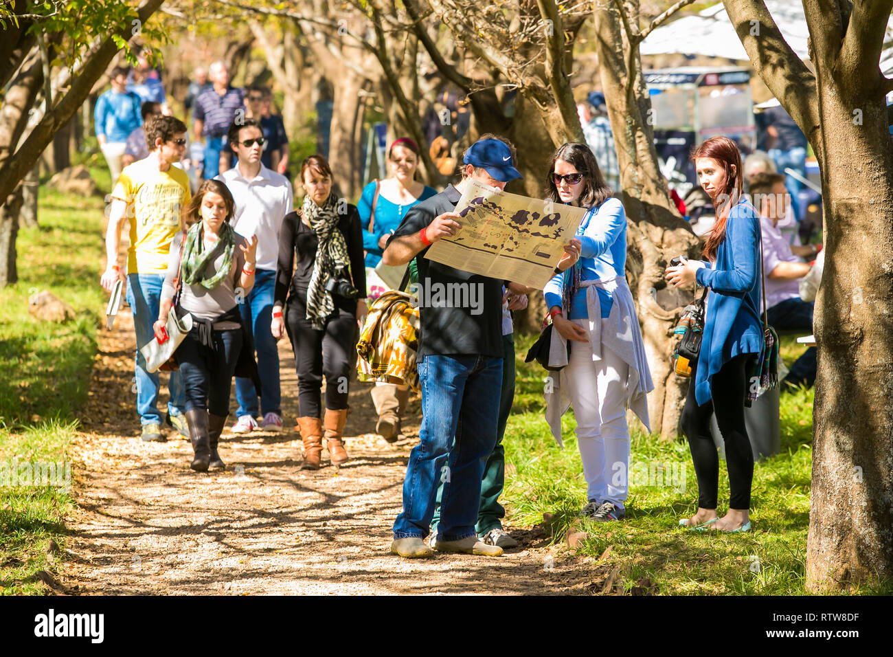 Johannesburg, South Africa - May 10 2014: A couple looking at a map in a Sculpture Park Stock Photo