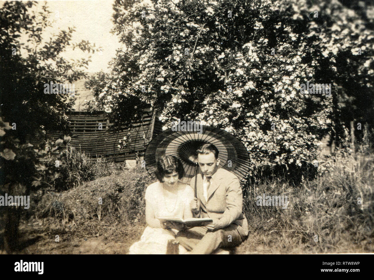 America United States 1920s Young People Sit On The Bench And