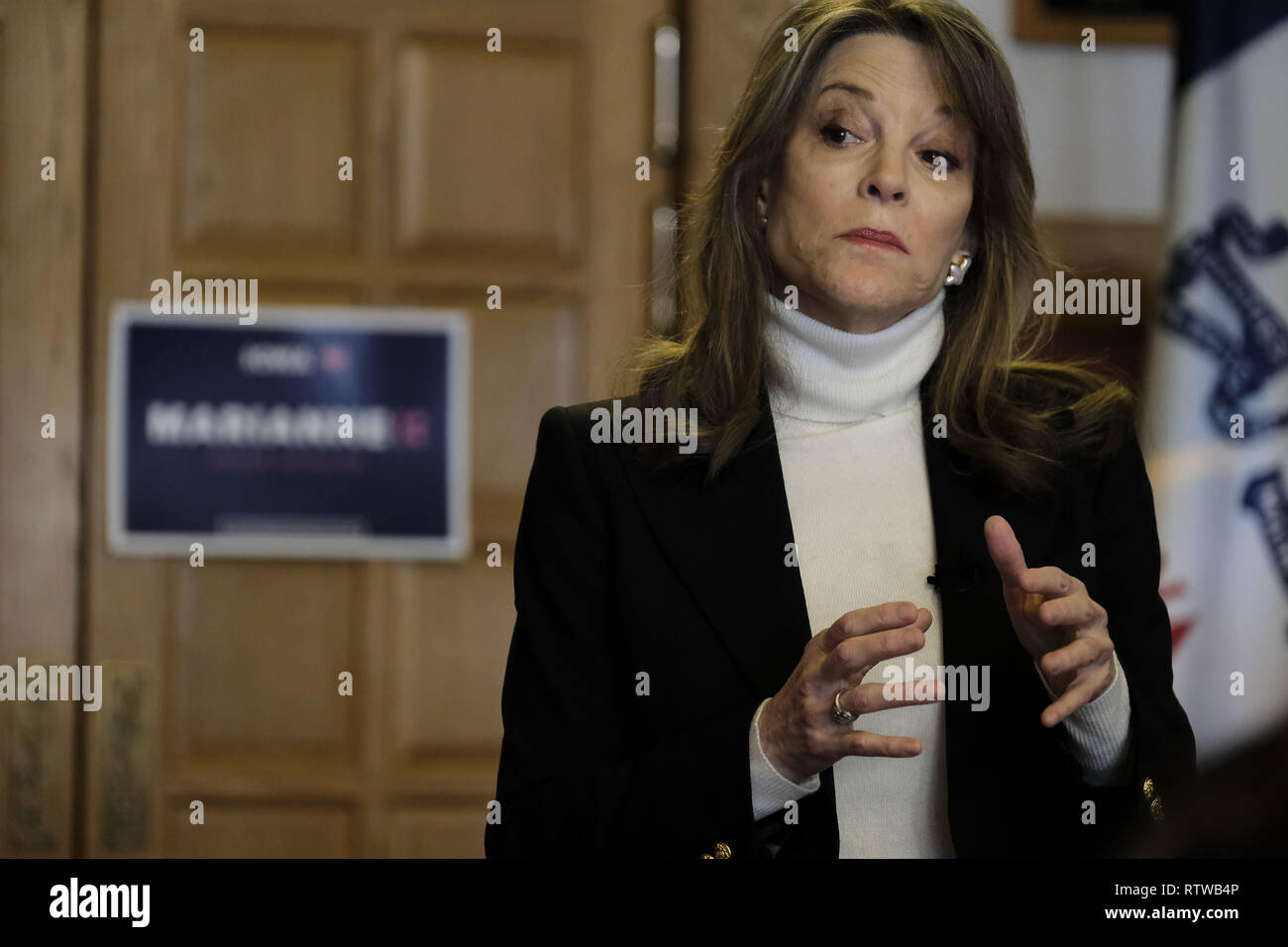 Denison, IOWA, USA. 2nd Mar, 2019. Author and spiritual guru MARIANNE WILLIAMSON speaks at the Donna Reed Theatre and talks about poverty in America, in Denison, Iowa Saturday, March 2, 2018, while exploring a presidential run for 2020. Credit: Jerry Mennenga/ZUMA Wire/Alamy Live News Stock Photo