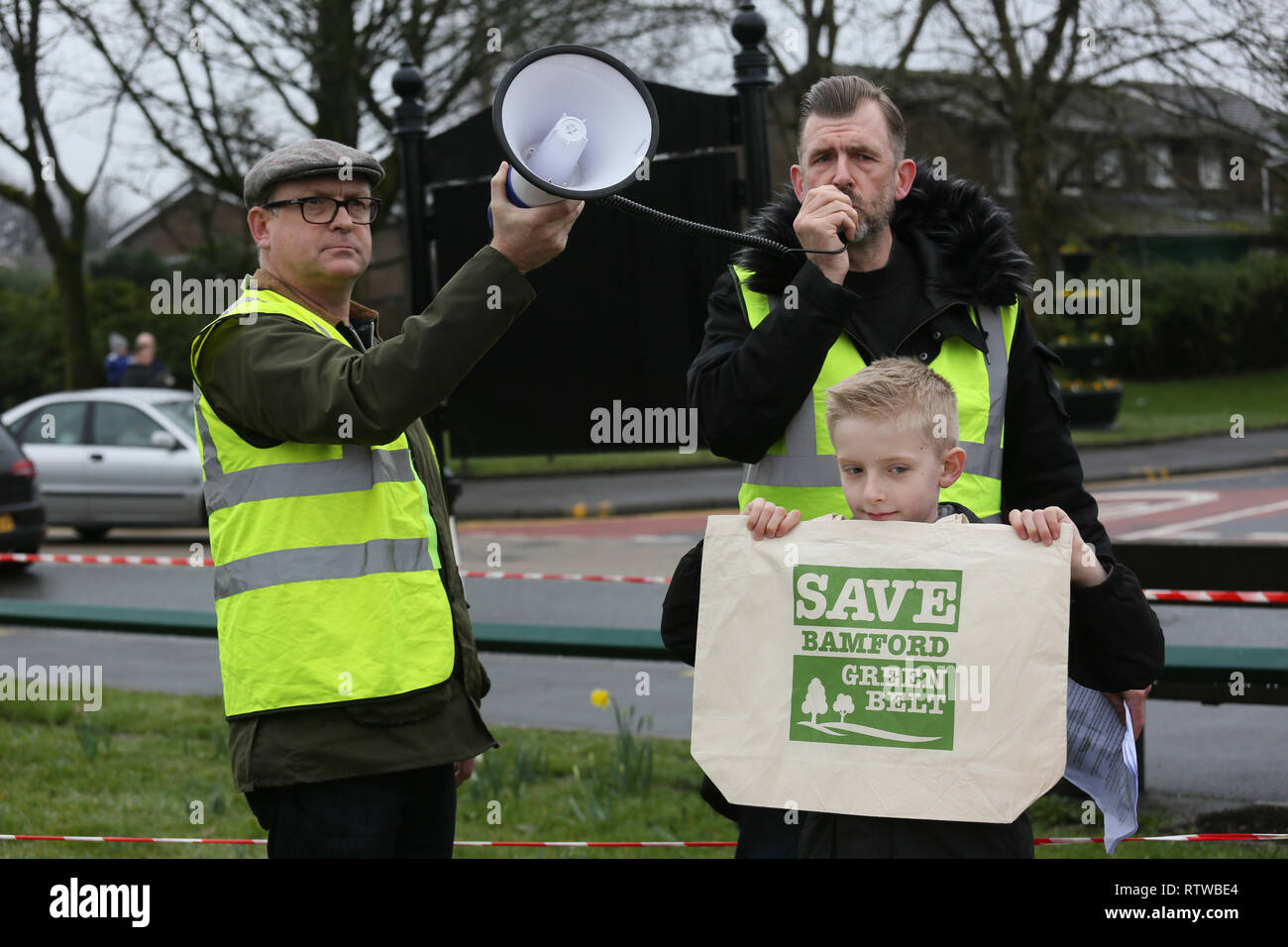 Rochdale, UK. 2nd March 2019. Ramblers, dog walkers and local families hold a protest to support the opposition of the Manchester proposal to develop luxury dwellings on Bamfords greenbelt, Bamford, Rochdale,,  UK, 2nd March 2019 (C)Barbara Cook/Alamy Live News Credit: Barbara Cook/Alamy Live News Stock Photo