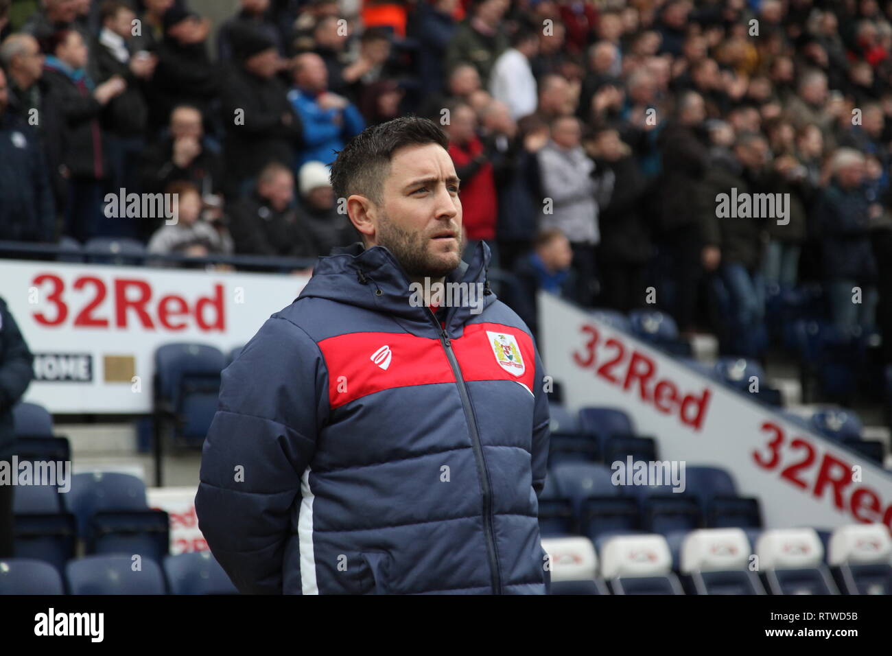 Preston, Lancashire, UK. Bristol City manager Lee Johnson in the dugout ahead of the Championship game between Preston North End and Bristol City at Deepdale which ended in a 1-1 draw. Stock Photo