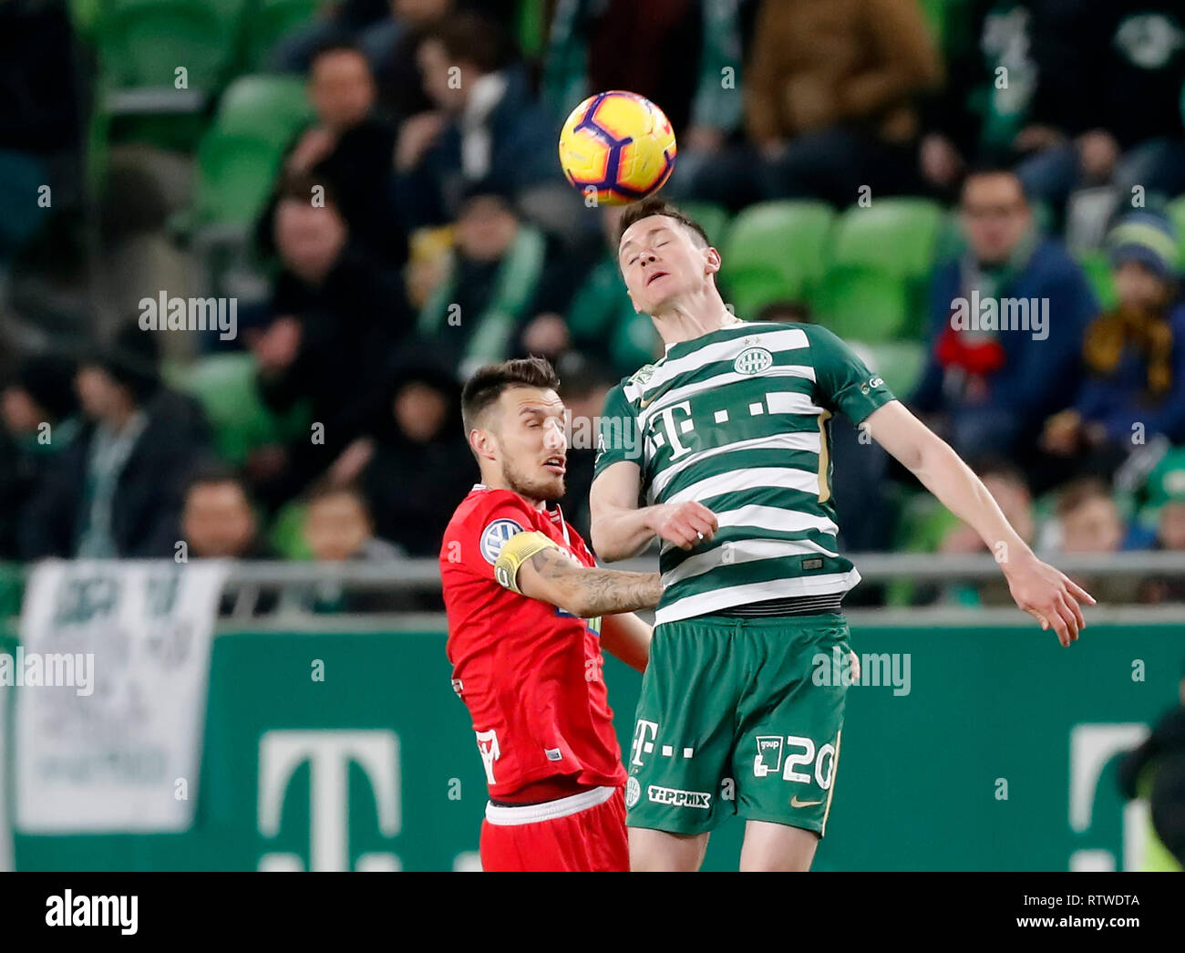 BUDAPEST, HUNGARY - MARCH 2: (r-l) David Markvart of DVTK controls the ball  next to Roland Varga of Ferencvarosi TC during the Hungarian OTP Bank Liga  match between Ferencvarosi TC and DVTK