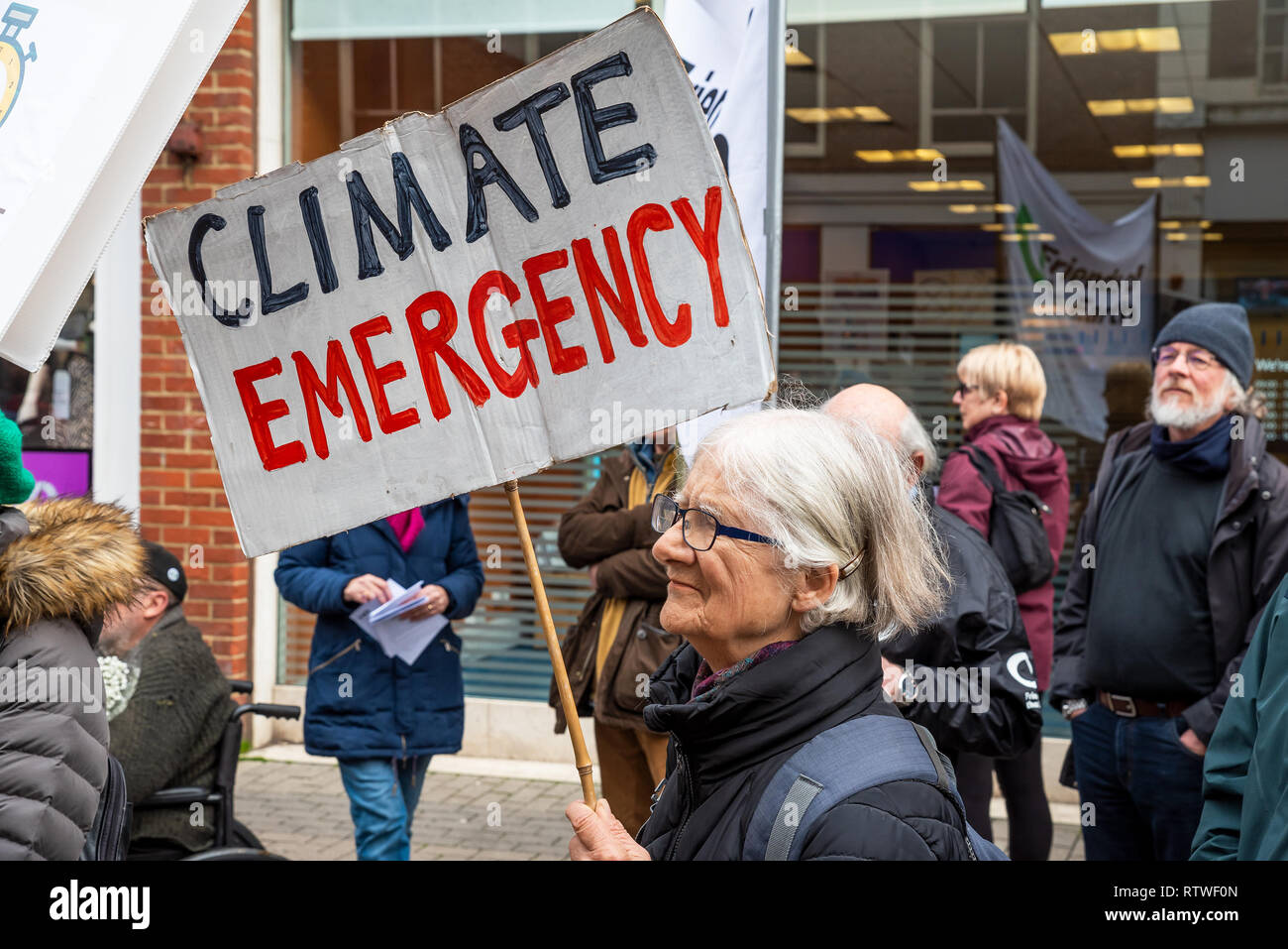 Canterbury, UK. 23rd February 2019. Supporters of the Canterbury Extinction Rebellion Group form up in the City Centre then take part in a symbolic funeral procession representing the death of plants, animals, humans and the planet due to the climate crisis, loss or life. The protest culminated in a swarming action blocking St. Peters Place. Police were present but didn't interfere, there were no arrests. Credit: Stephen Bell/Alamy Live News Stock Photo