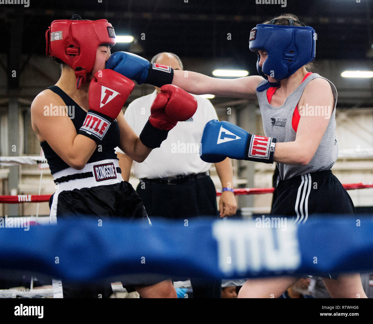 March 2, 2019: Natalie Mills of Illinois (right) hits Yurika Sano (left) with a right at the Arnold Sports Festival in Columbus, Ohio, USA. Brent Clark/Alamy Live News Stock Photo