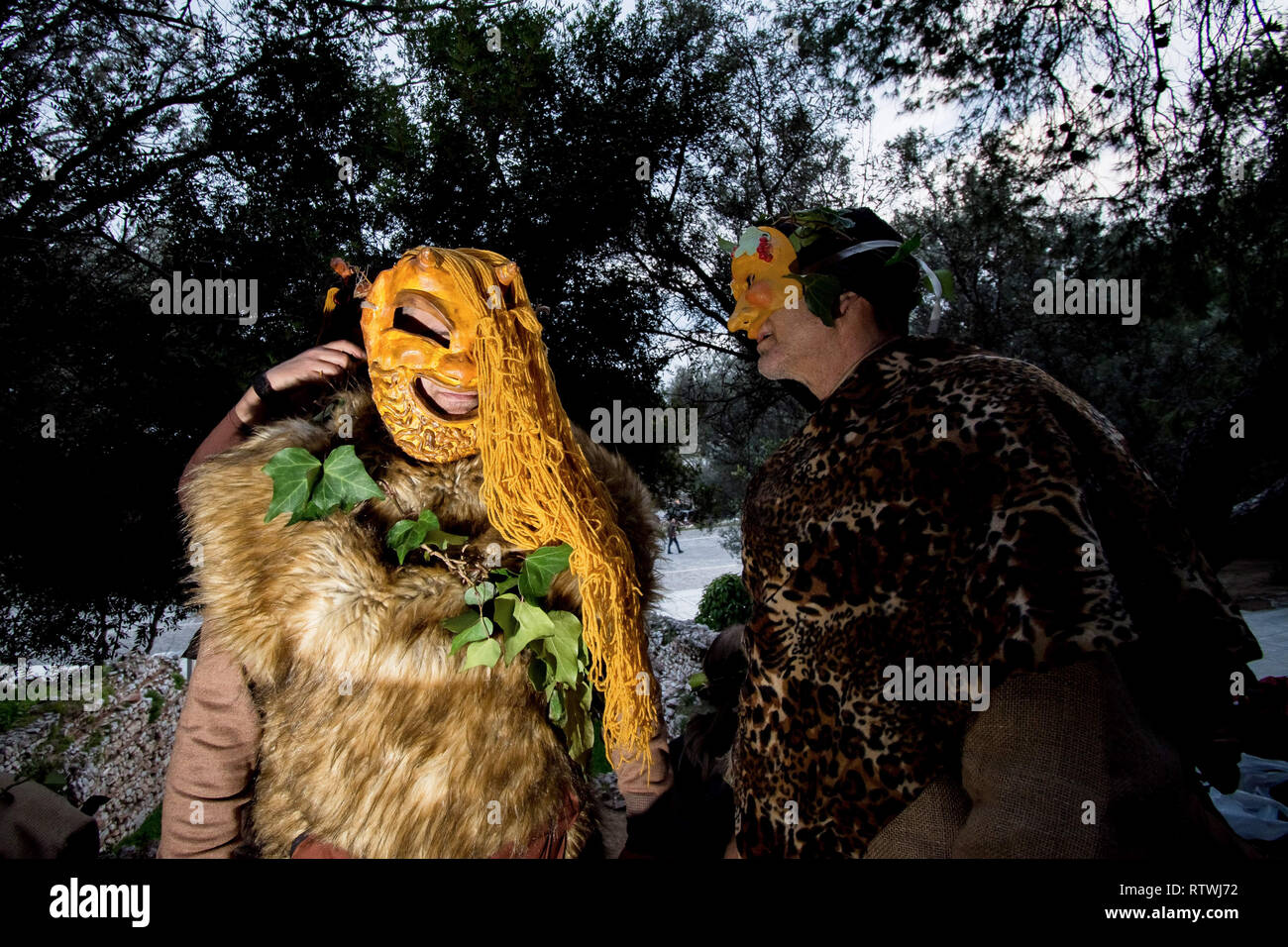 Participants are seen dressed up during the Falliforia or Fallagogia, an ancient Greek festival honoring the god Dionysus with orgiastic character. Stock Photo
