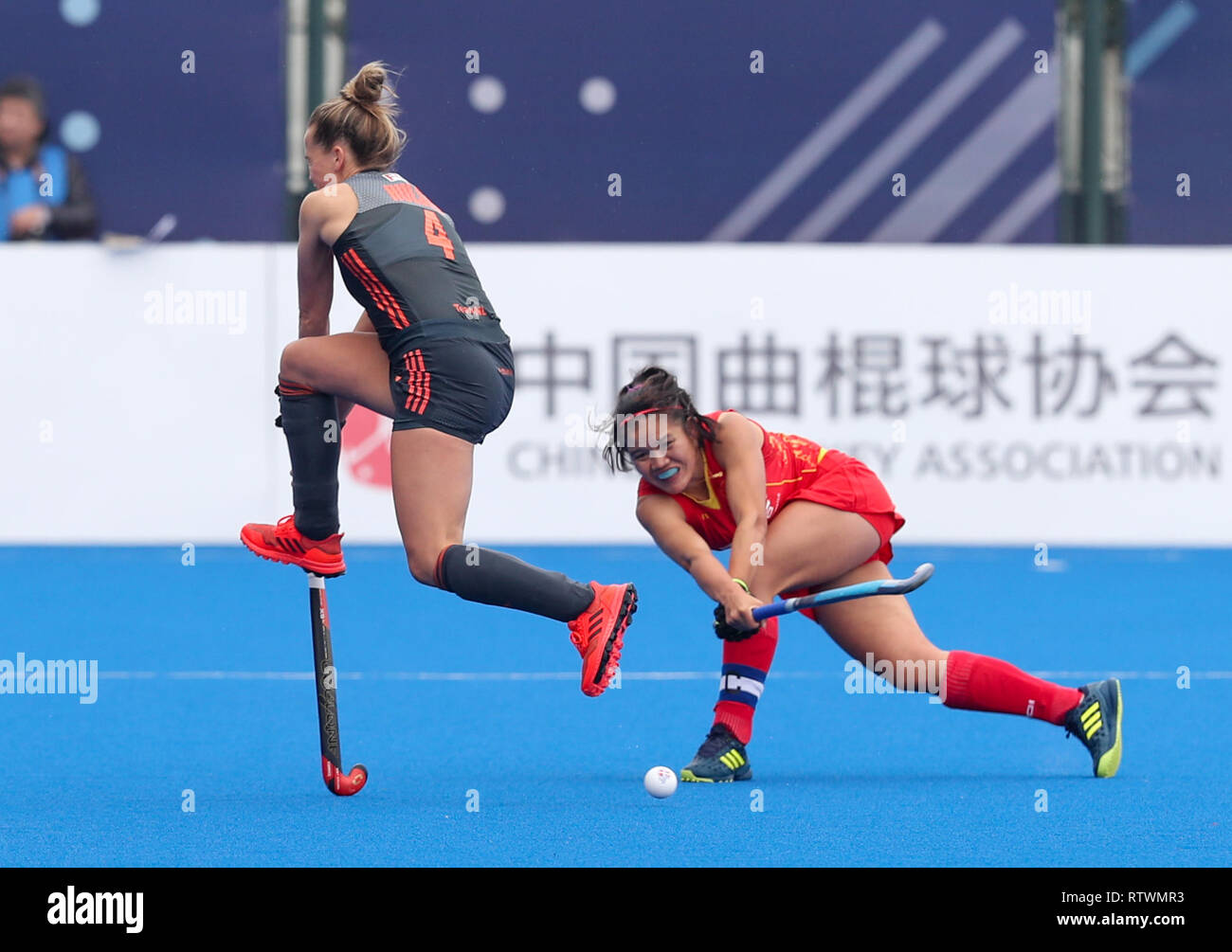 Changzhou, China's Jiangsu Province. 3rd Mar, 2019. Lieke Hulsen (L) of the Netherlands vies with Zhang Jinrong of China during the 2019 FIH PRO LEAGUE women's league hockey match in Changzhou, east China's Jiangsu Province, March 3, 2019. The Netherlands won 2-1. Credit: Yang Lei/Xinhua/Alamy Live News Stock Photo