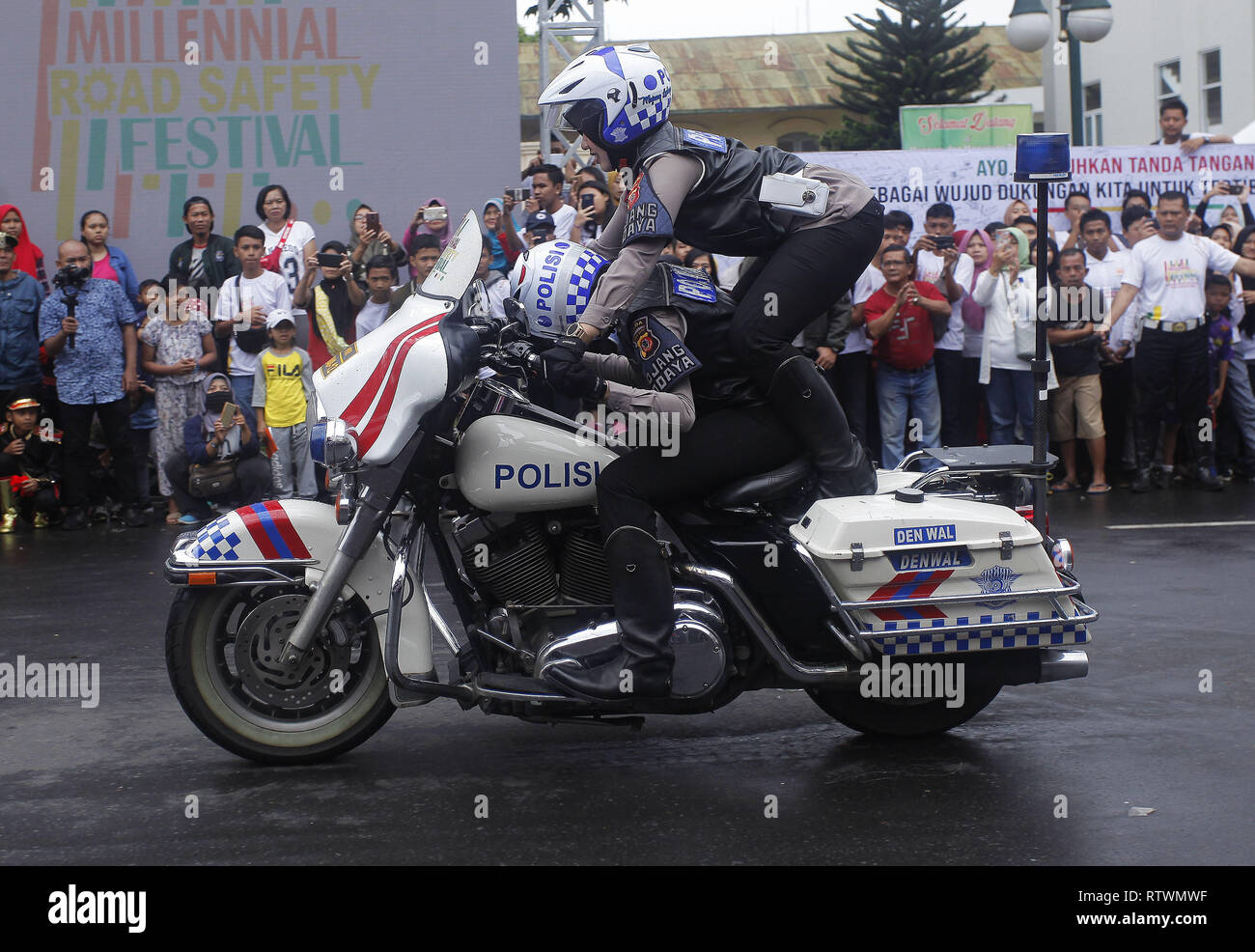 Bogor, West Java, Indonesia. 3rd Mar, 2019. Indonesian female police (POLWAN) seen free styling with their motorbike during the festival.Thousands of participants who were dominated by Bogor millennials attended the Millennial Road Safety Festival (MRSF) with hope that Indonesia's next generation could be safer and orderly when using the road. Credit: Adriana Adinandra/SOPA Images/ZUMA Wire/Alamy Live News Stock Photo