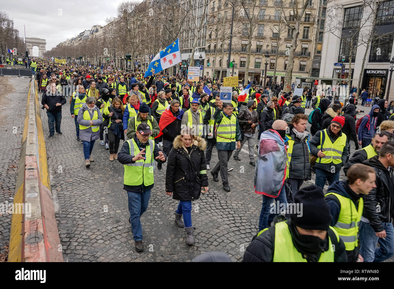 Paris, France. 02 March 2019.Thousands of yellow vests (Gilets Jaunes)  protests in Paris calling for lower fuel taxes, reintroduction of the  solidarity tax on wealth, a minimum wage increase, and Emmanuel Macron's