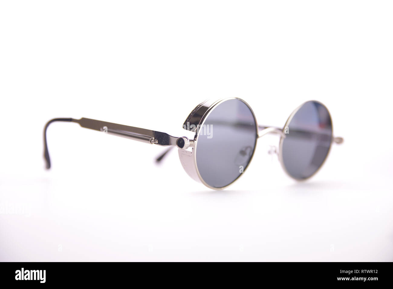 fashionable glasses in the style of steampunk on a white background. Stock Photo