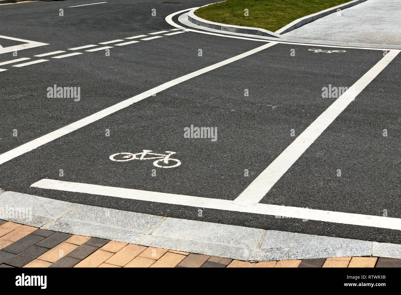 Bicycle Lane Intersects Asphalt Road. Road Junction Stock Photo Alamy