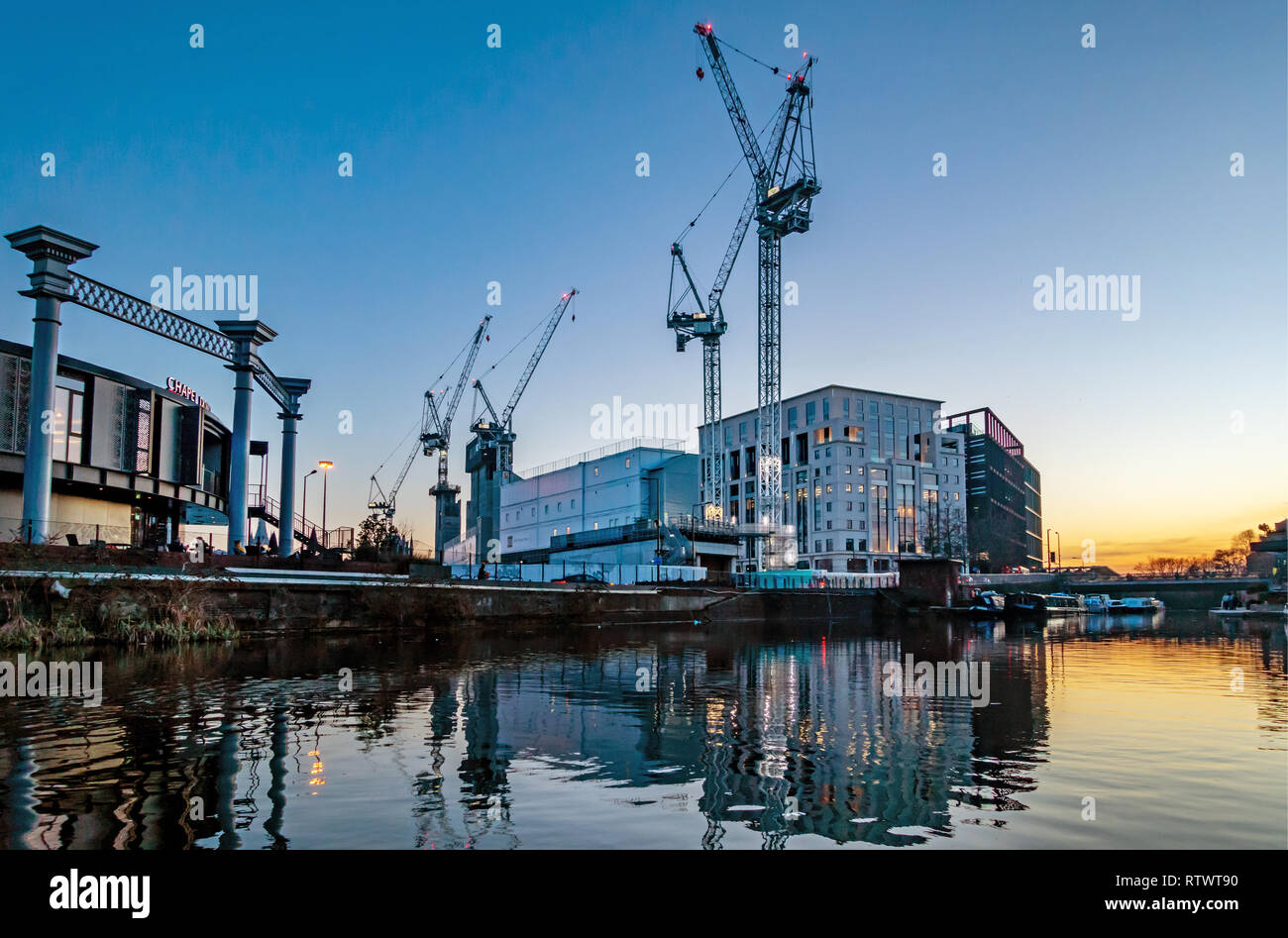 sunset view across the Regents Canal of the construction site of the new Google UK HQ at in Kings Cross, London, England Stock Photo