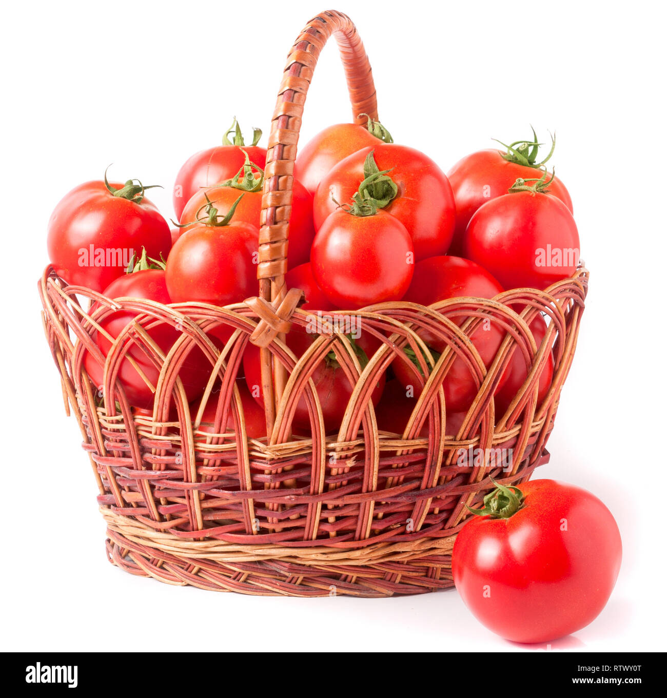 red tomatoes in a wicker basket isolated on white background Stock ...
