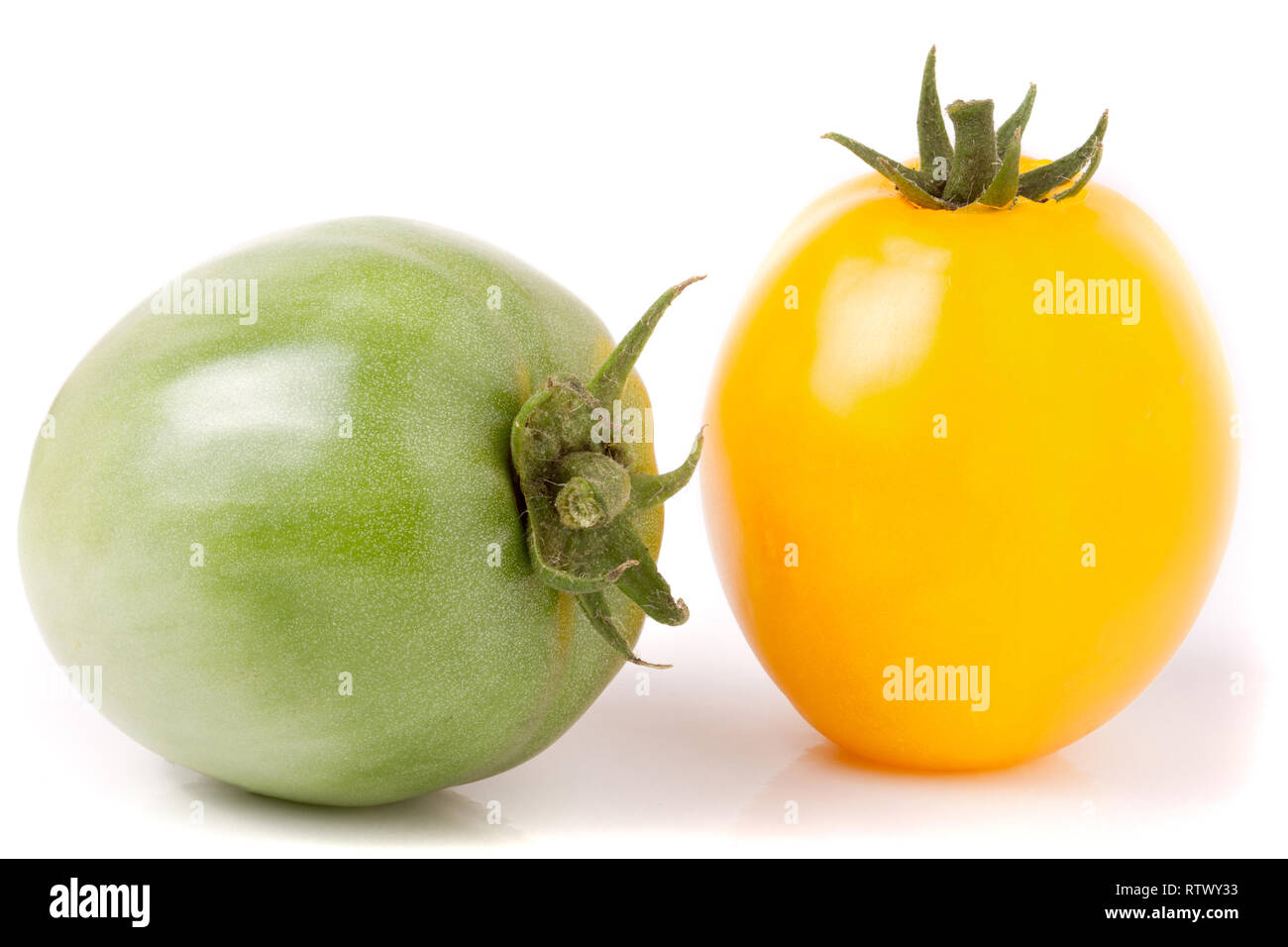 red and green tomatoes isolated on white background Stock Photo - Alamy