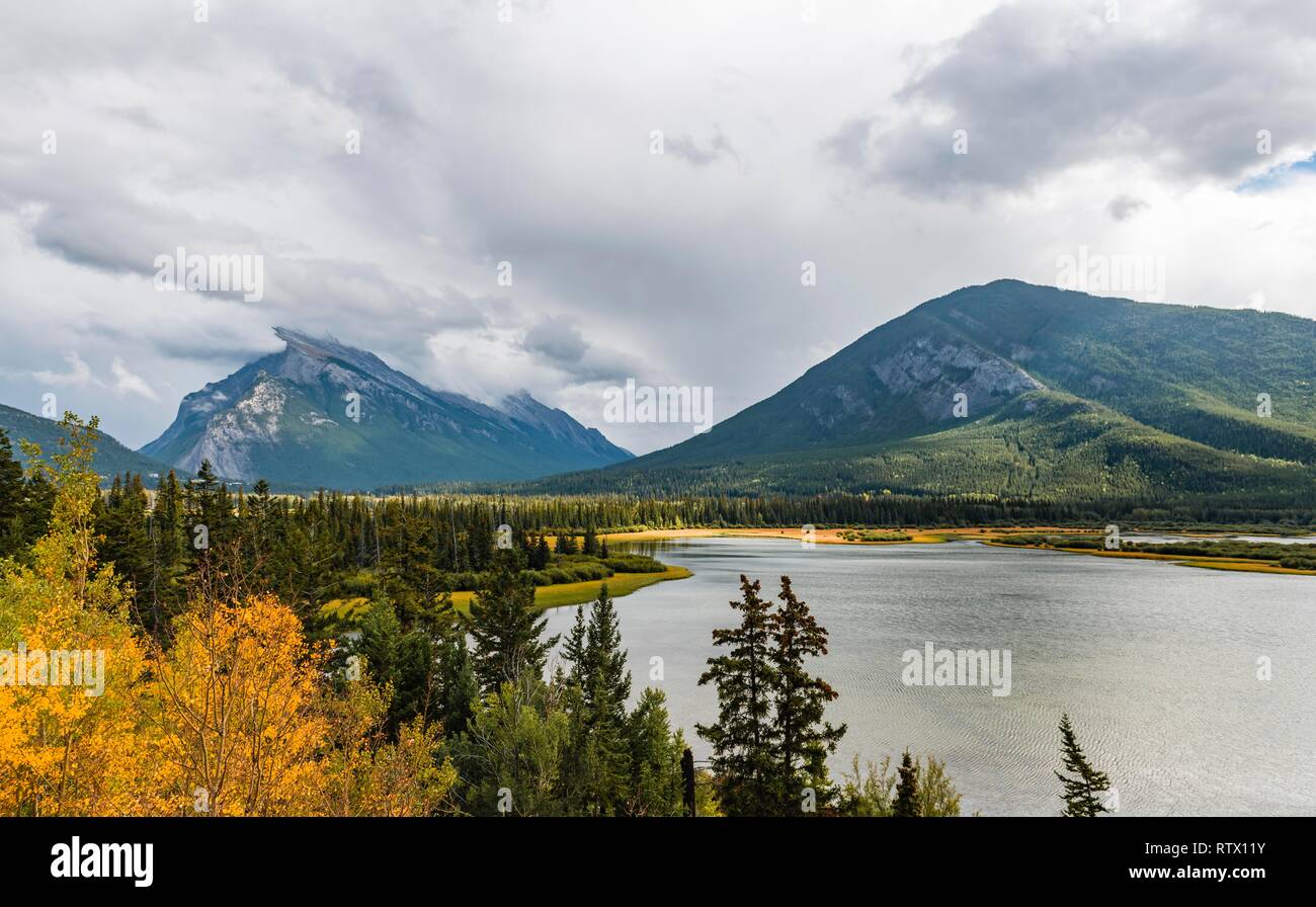 Autumnal mountain landscape with a lake, Vermilion Lakes, Banff National Park, Rocky Mountains, Alberta, Canada Stock Photo