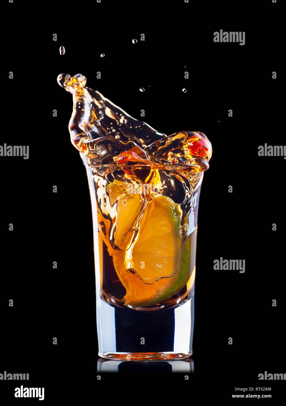 shot of tequila with splash Stock Photo