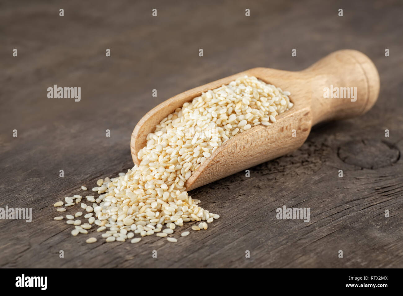 sesame seeds in scoop Stock Photo