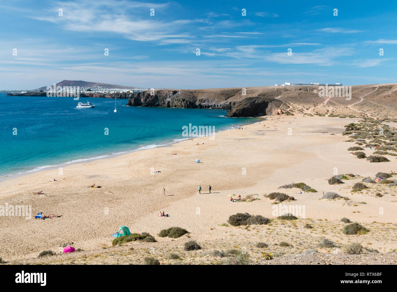The beautiful beach Playa Mujeres, one of the papagayo beaches in Lanzarote, Spain. Stock Photo