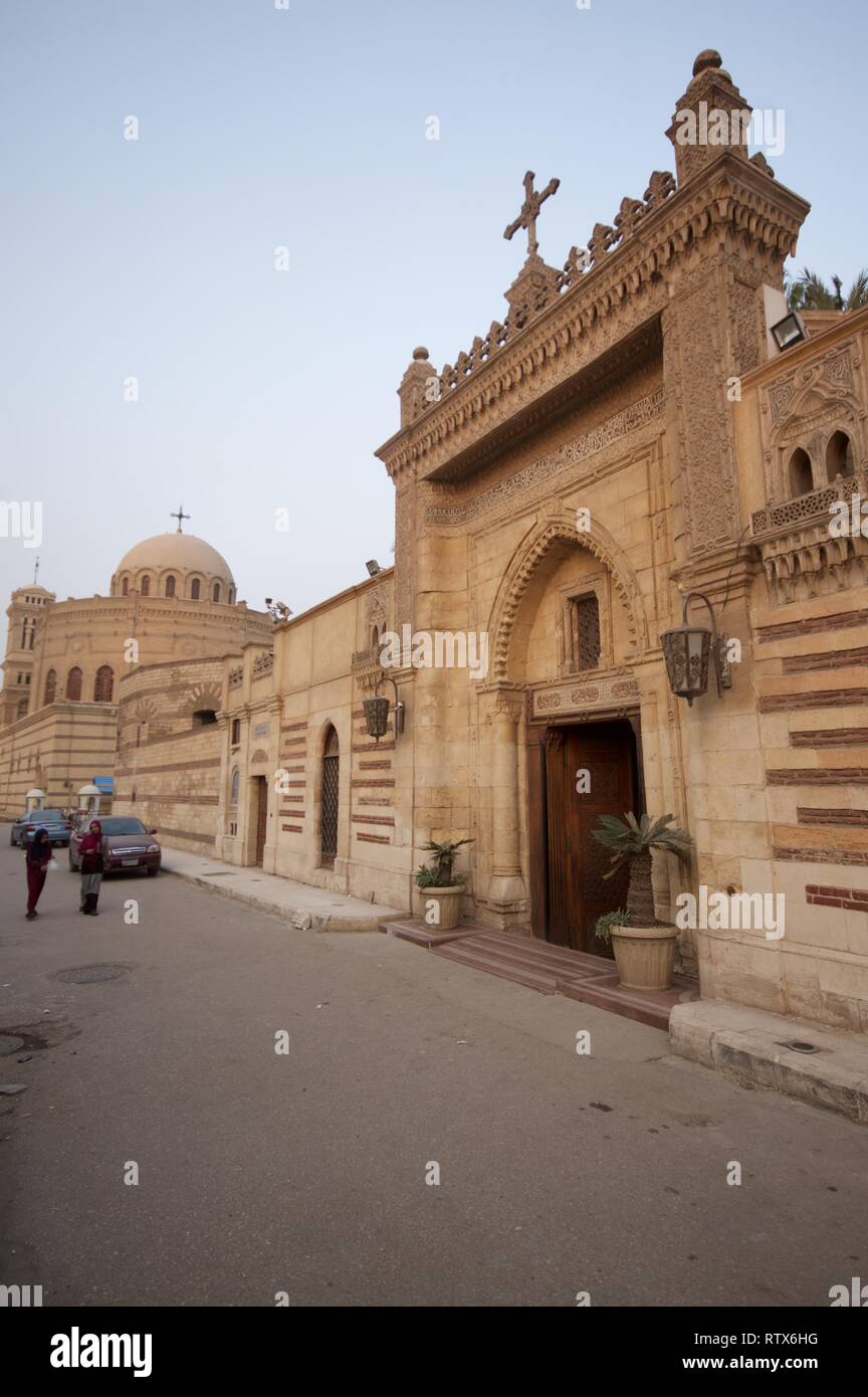 Street entrance to the Hanging Church, Cairo, with St George's monastery in the background Stock Photo