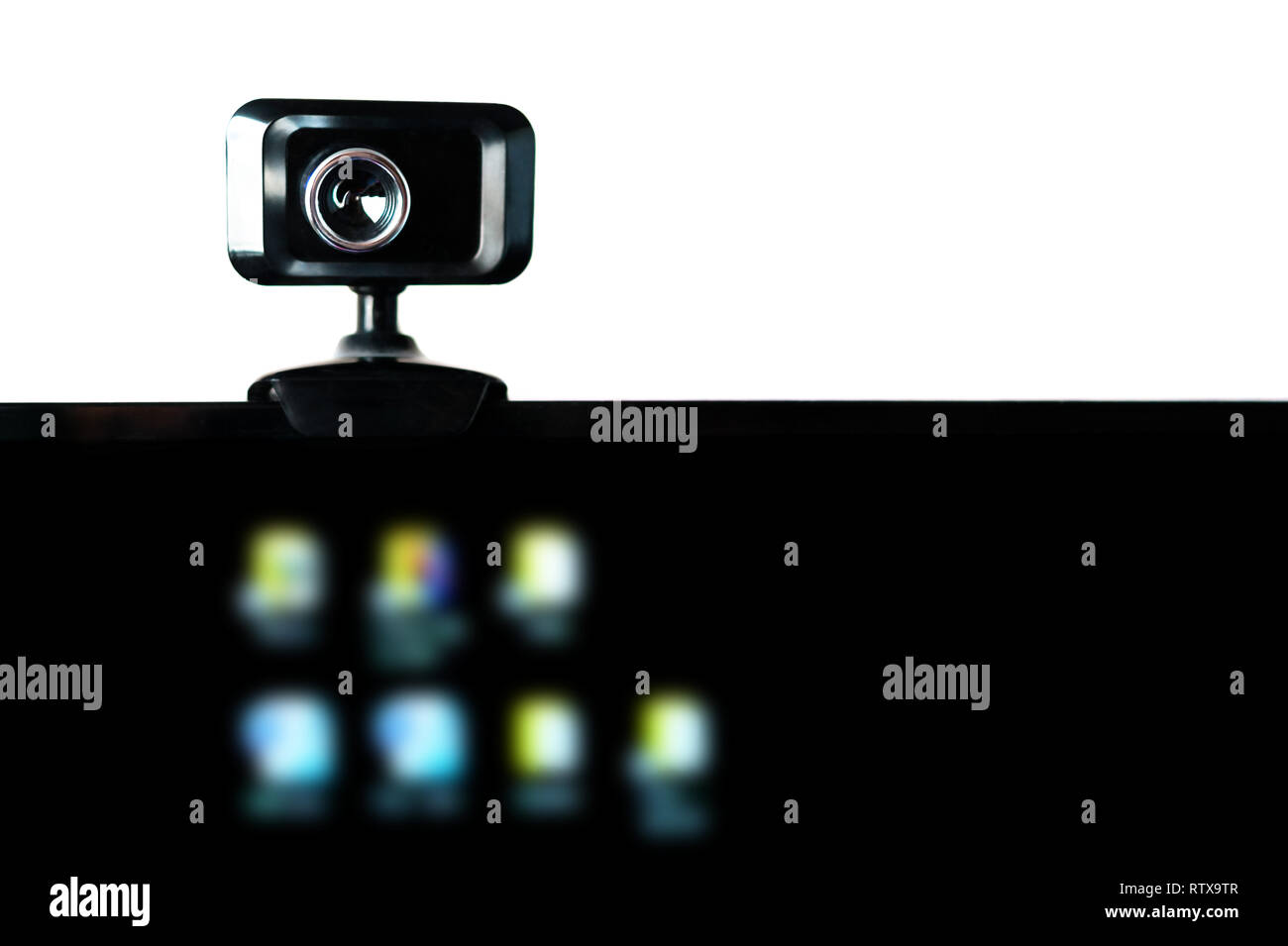 USB Webcam, Web Camera, Mounted on Computer Monitor with Blurred Icons on  Black Screen. Video Streaming, Webinar, Conference Call. Data Protection,  Ne Stock Photo - Alamy