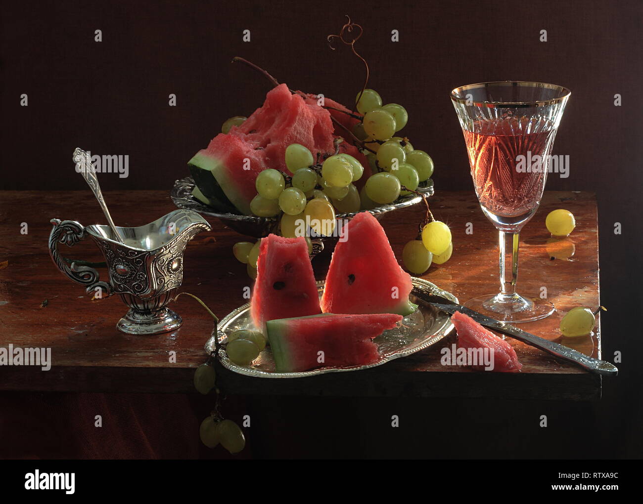 Still life with wine and watermelon Stock Photo Alamy