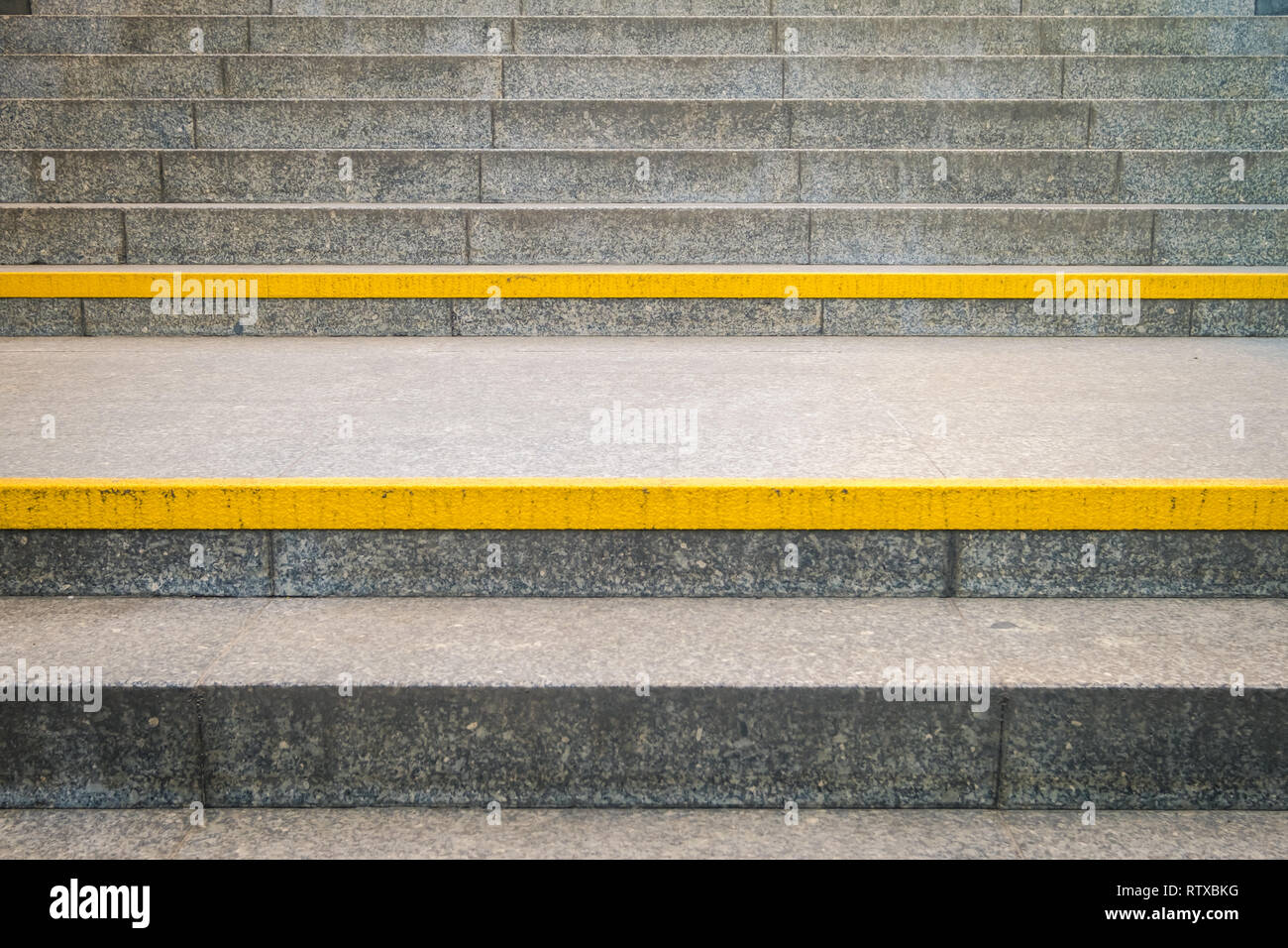 yellow warning line on stairway, urban signage example, Warsaw, Poland Stock Photo