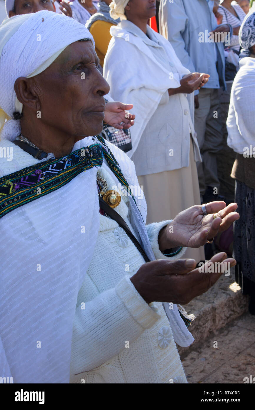 JERUSALEM - NOV 20, 2014: Ethiopian Jewish women pray at the Sigd, in Jerusalem, Israel. The Sigd is an annual holiday of the Ethiopian Jews Stock Photo