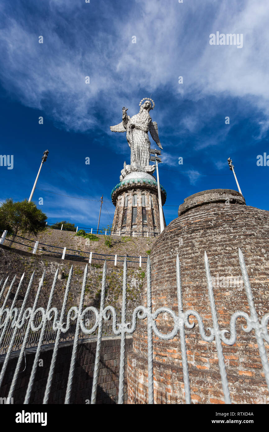 The monument of the Virgen del Panecillo looks magnificent in the morning on top of the small hill in the center of the city of Quito. Stock Photo