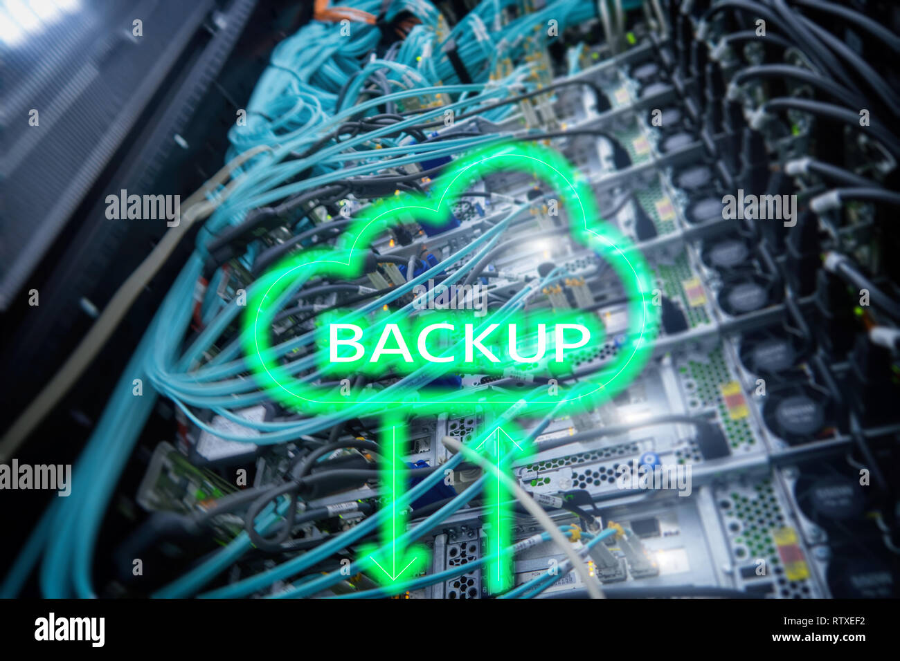 Backup button on modern server room background. Data loss prevention ...