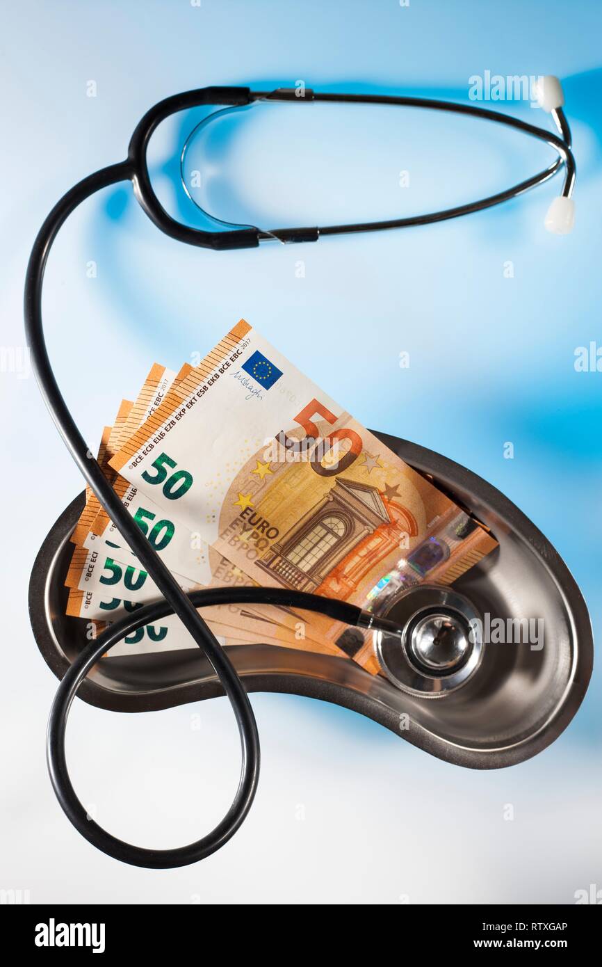 Stethoscope and money depicting medical costs in Europe Stock Photo Alamy