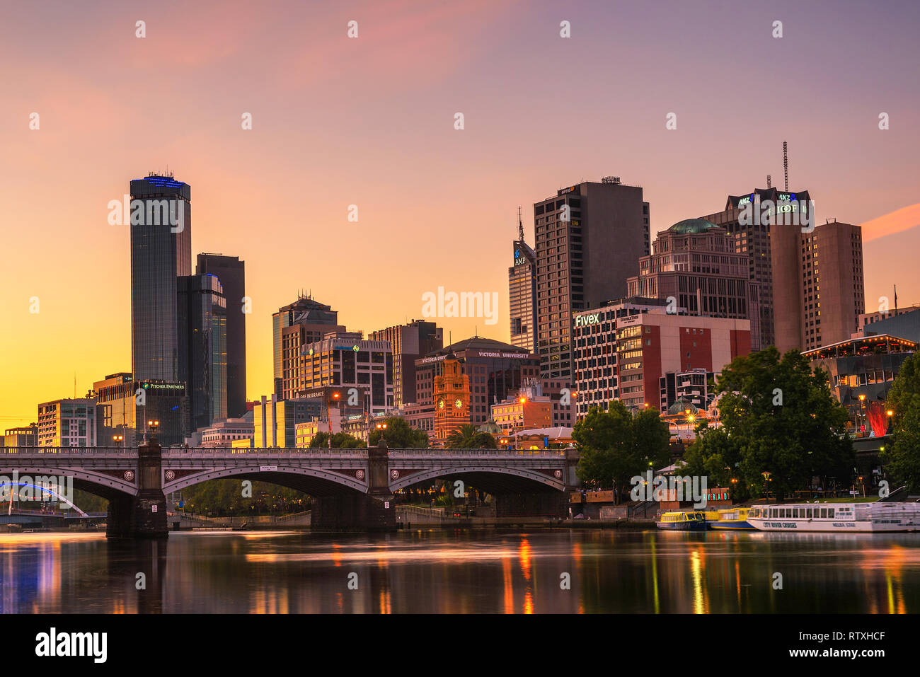 Sunset over Melbourne downtown and Yarra River Stock Photo