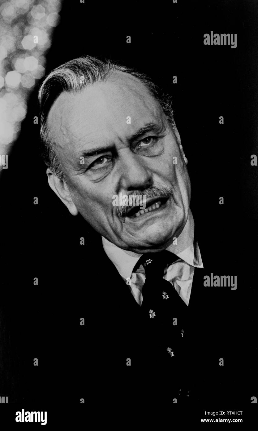 Enoch Powell MP. Right wing British politician speaking in London England 1980's John Enoch Powell MBE (16 June 1912 – 8 February 1998) was a British politician, classical scholar, author, linguist, soldier, philologist and poet. He served as a Conservative Member of Parliament (1950–1974), then Ulster Unionist Party (UUP) MP (1974–1987), and was Minister of Health (1960–1963).  Before entering politics, Powell was a classical scholar, becoming a full professor of Ancient Greek at the age of 25 in Australia. During World War II, he served in both staff and intelligence positions, reaching the  Stock Photo