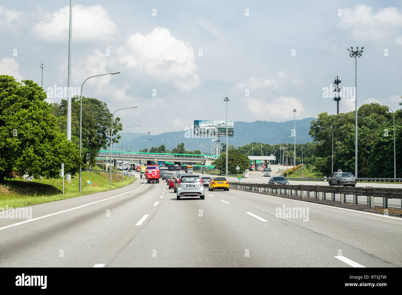 Malaysia.  Modern Highway (North-South Expressway E2) between Melaka and Kuala Lumpur. Stock Photo