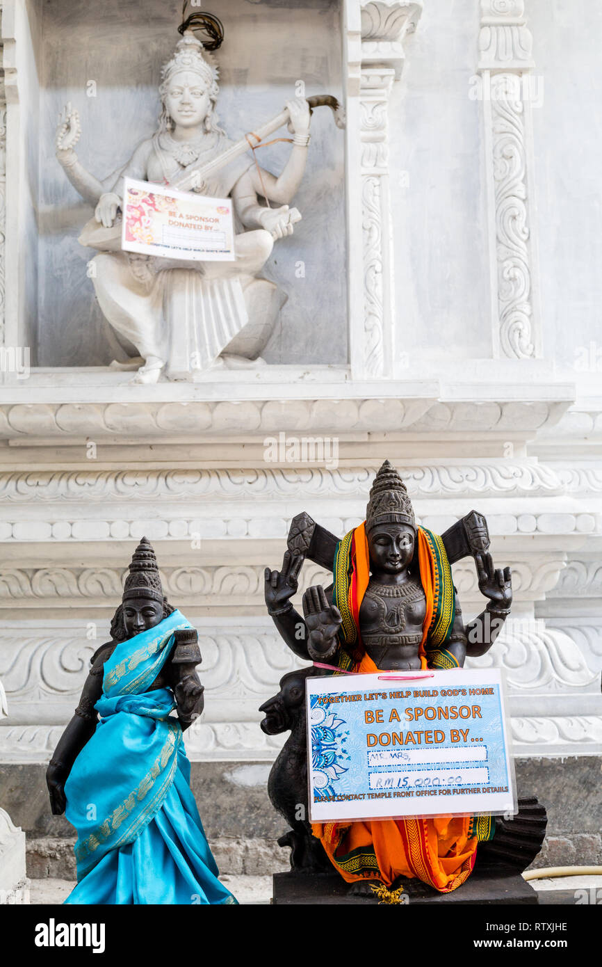 Signs on Hindu Deities Soliciting Funds for Temple Refurbushment, Hindu Sri Maha Muneswarar Temple, Kuala Lumpur, Malaysia. Stock Photo