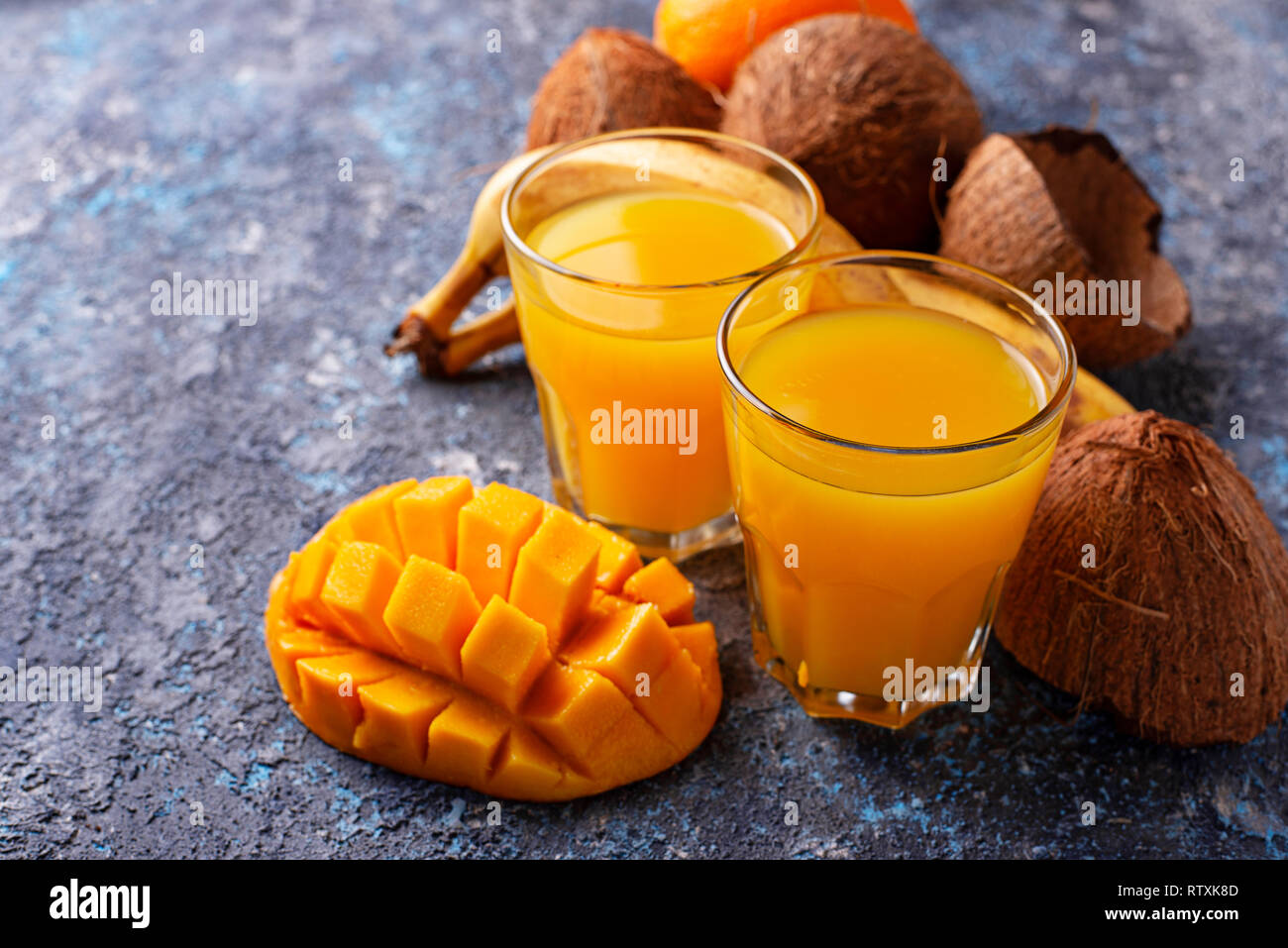 Fresh tropical mix fruit juice Stock Photo - Alamy